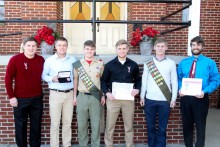 Jeremiah is welcomed into Scouting’s highest rank by his five Eagle Scout brothers. Photo Credit: Anthony Davis/The Herald-Dispatch